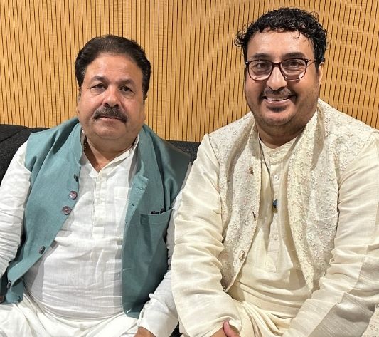 Charan Ji with Mr. Rajeev Shukla